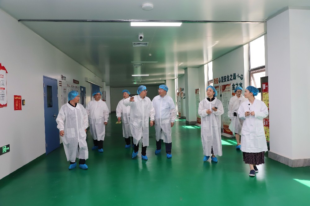 山东鲁华海洋生物科技有限公司一行到访龙心生物参观交流